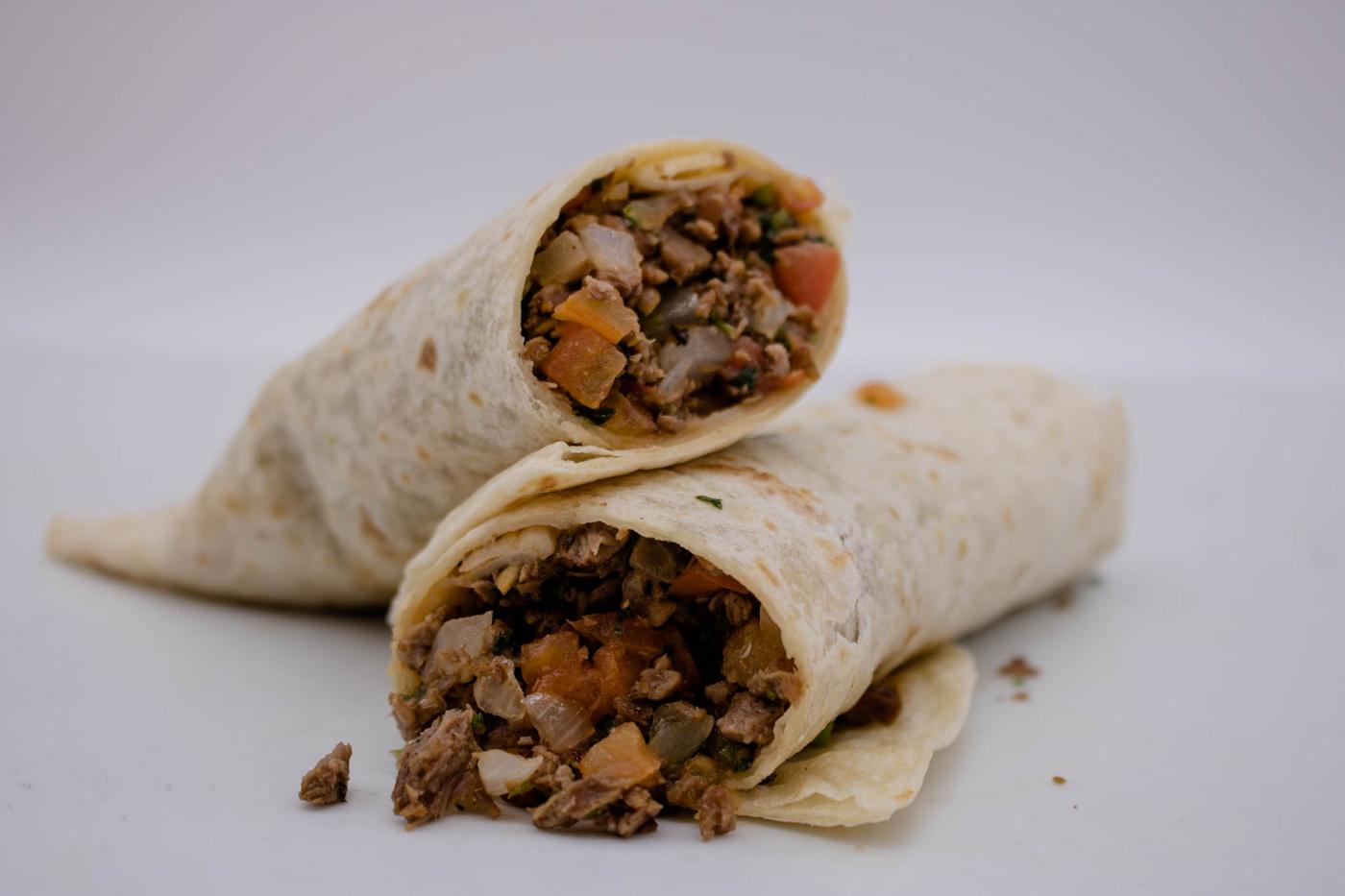 A burrito cut open to show the filling
