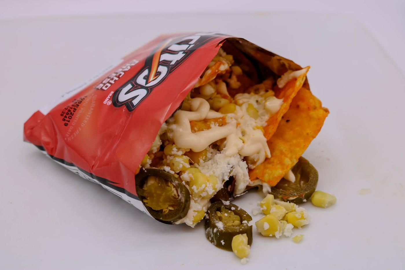Dorinachos served in an opened bag of Doritos